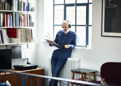 Man Looking at Records