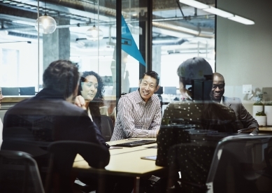 Group of people meeting in office